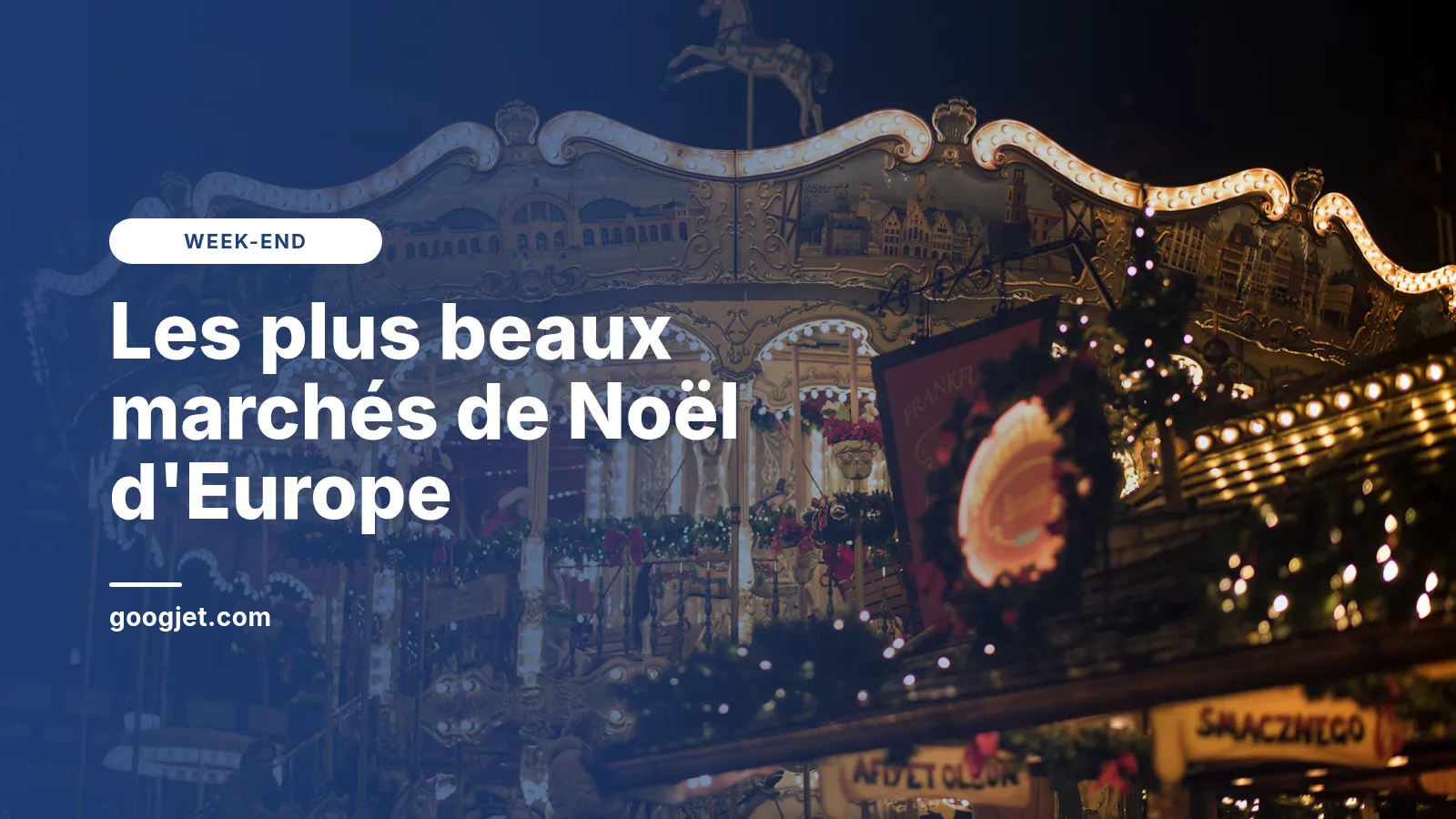 Manège illuminé d'un marché de Noël le soir